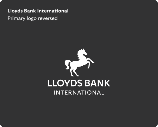Lloyds Bank International primary logo reversed has white horse positioned centrally above white 'Lloyds Bank' wording, with 'International' smaller below.