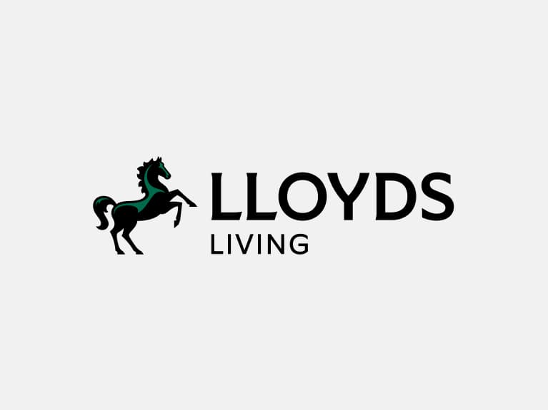 Lloyds Living secondary logo positive has black horse with green highlights positioned to the left of 'Lloyds Living".