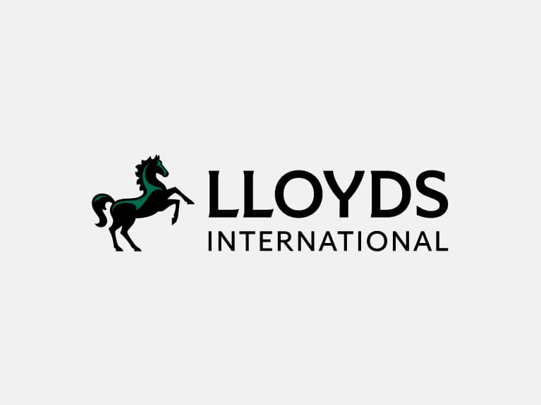 Lloyds International secondary logo positive has black horse with green highlights positioned to the left of 'Lloyds International".